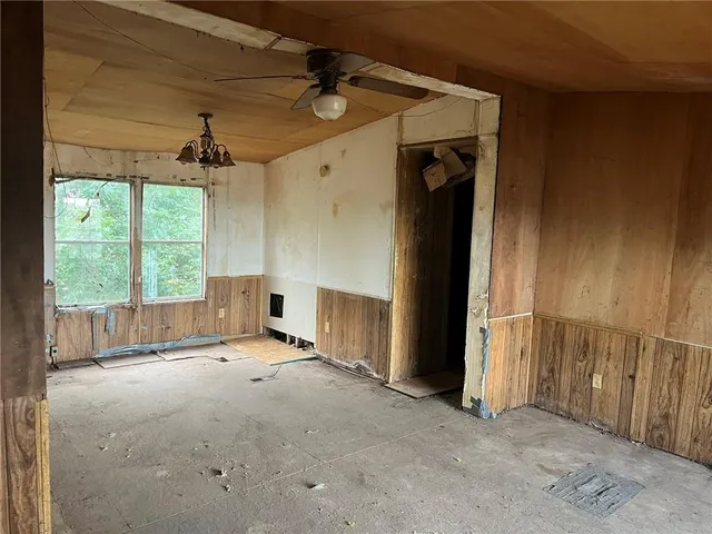 an empty room with windows