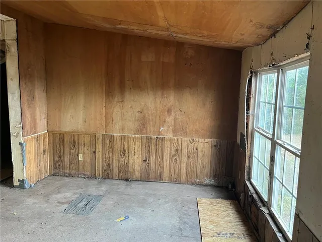 an empty room with windows