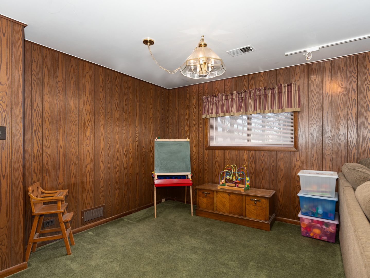 10S144 Ridge Road Naperville, IL 60565 - Photo 17 of 28 a spacious bedroom with a bed and a chair