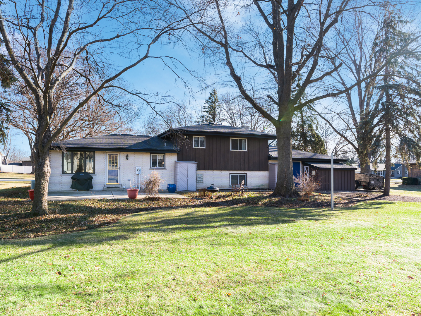 10S144 Ridge Road Naperville, IL 60565 - Photo 26 of 28 a house that has a tree in front of it