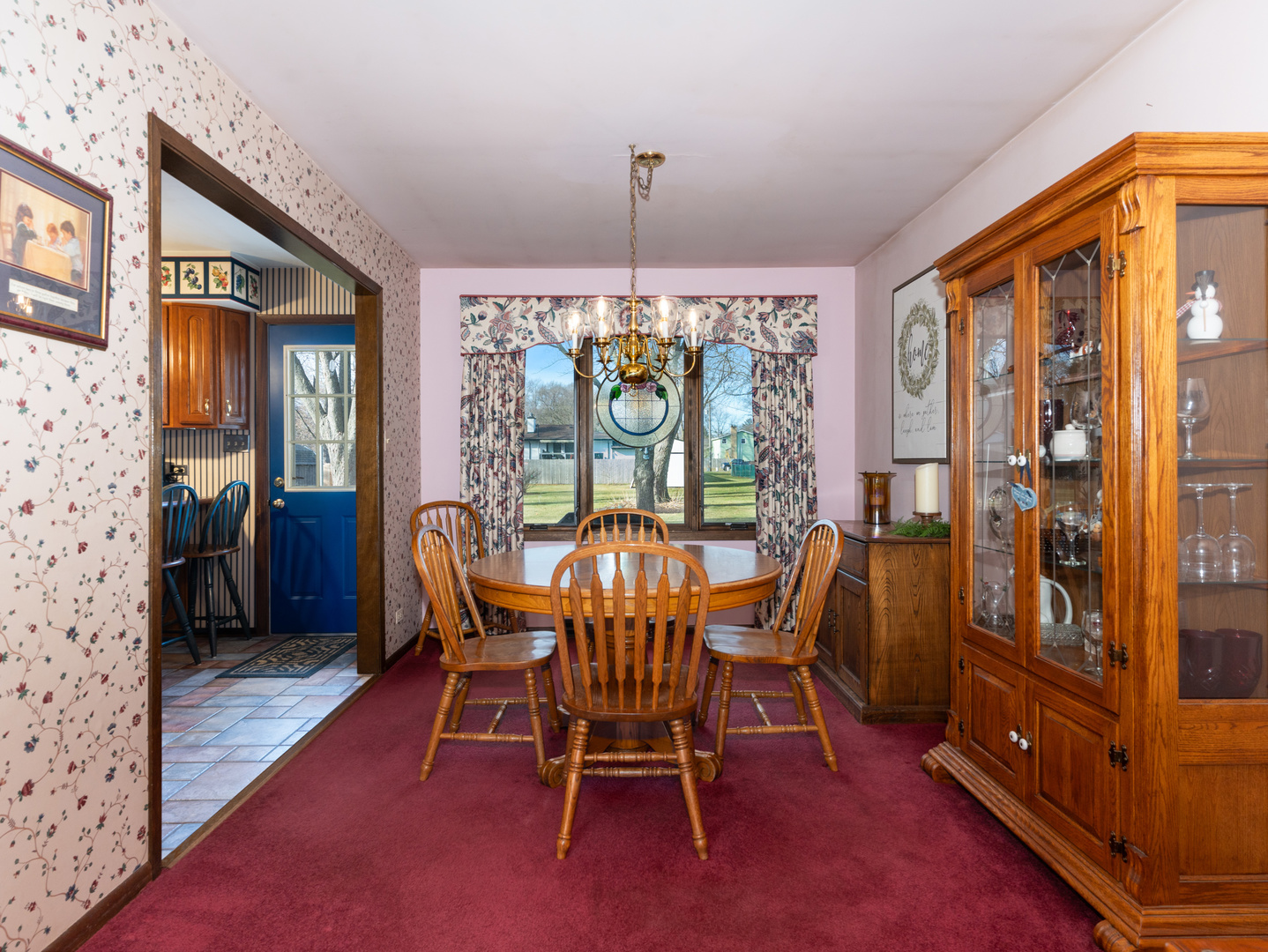 10S144 Ridge Road Naperville, IL 60565 - Photo 5 of 28 a dining room with furniture a chandelier and window