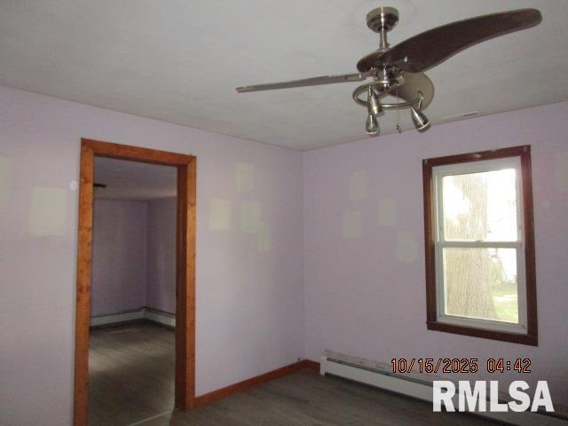 1121 Southwest 6th Street Fairfield, IL 62837 - Photo 4 of 7 a view of a room with a window and wooden floor