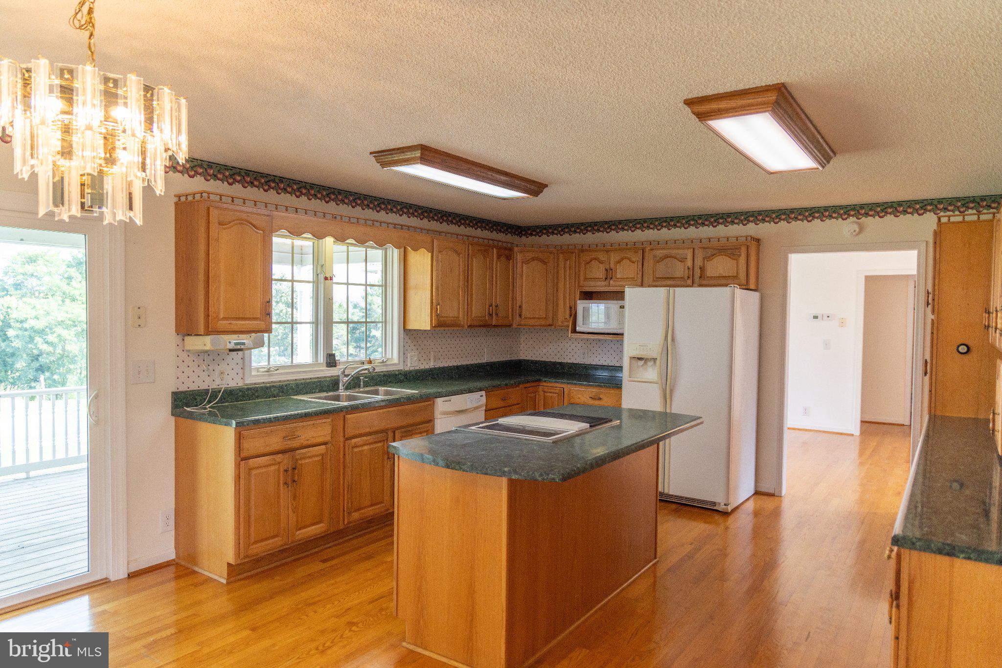 2046 Simms Hill Road Lindside, WV 24951 - Photo 22 of 69 Spacious kitchen with warm wood accents.