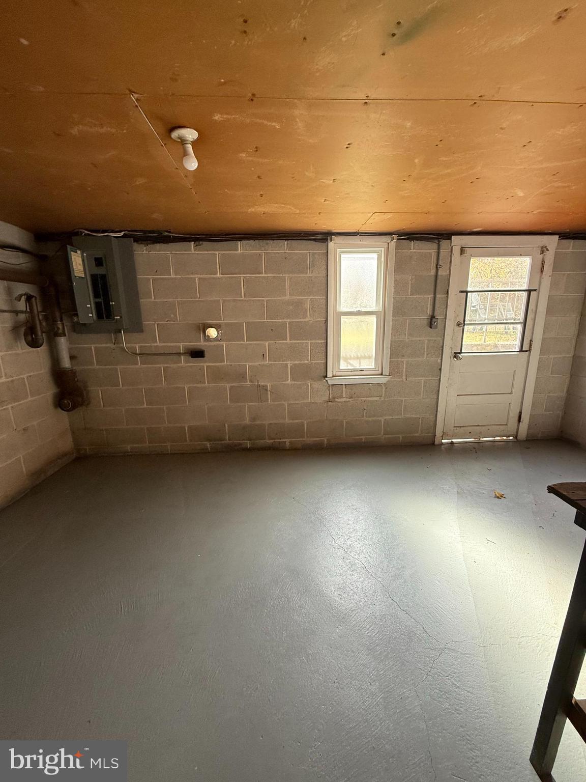 1123 Almond Road, Unit 2 Pittsgrove, NJ 08318 - Photo 9 of 9 an empty room with windows