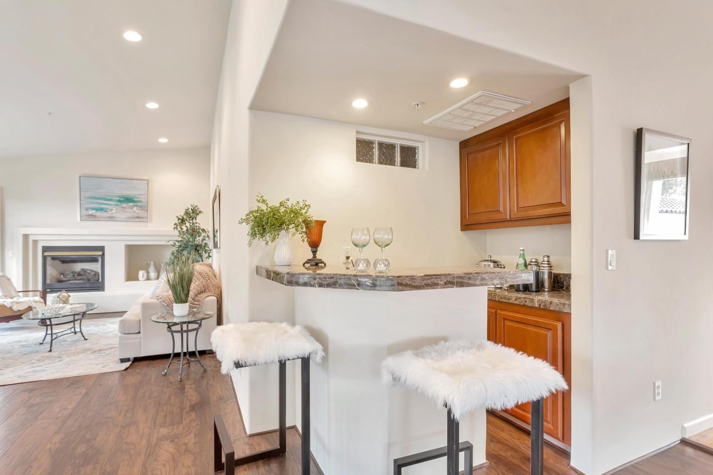 3120 Middle Ranch Road Pebble Beach, CA 93953 - Photo 11 of 39 a kitchen with a table and chairs in it