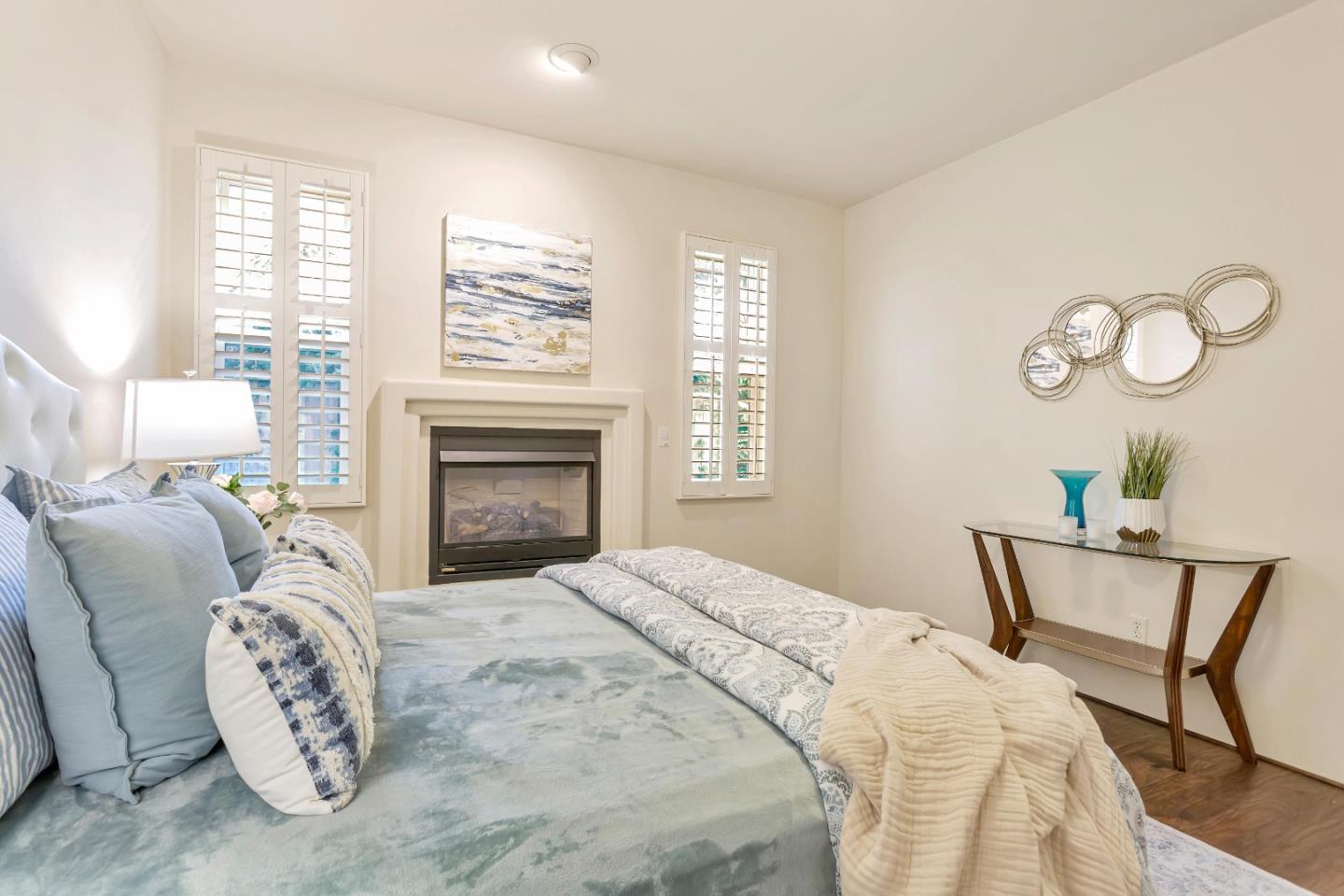 3120 Middle Ranch Road Pebble Beach, CA 93953 - Photo 16 of 39 a bedroom with a bed and a fireplace