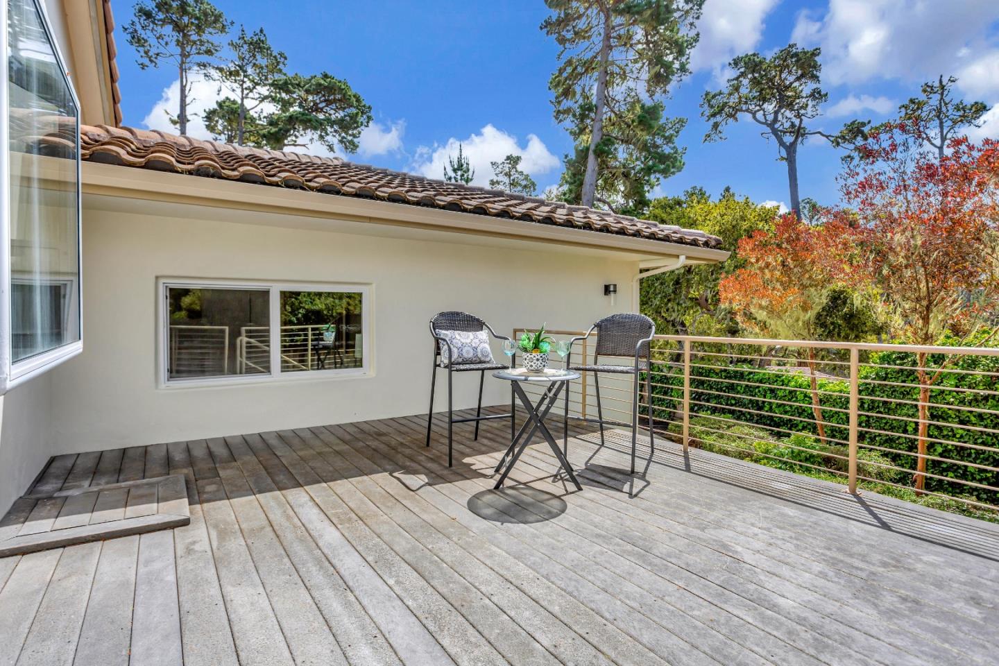 3120 Middle Ranch Road Pebble Beach, CA 93953 - Photo 34 of 39 a view of a chairs and table on the wooden floor