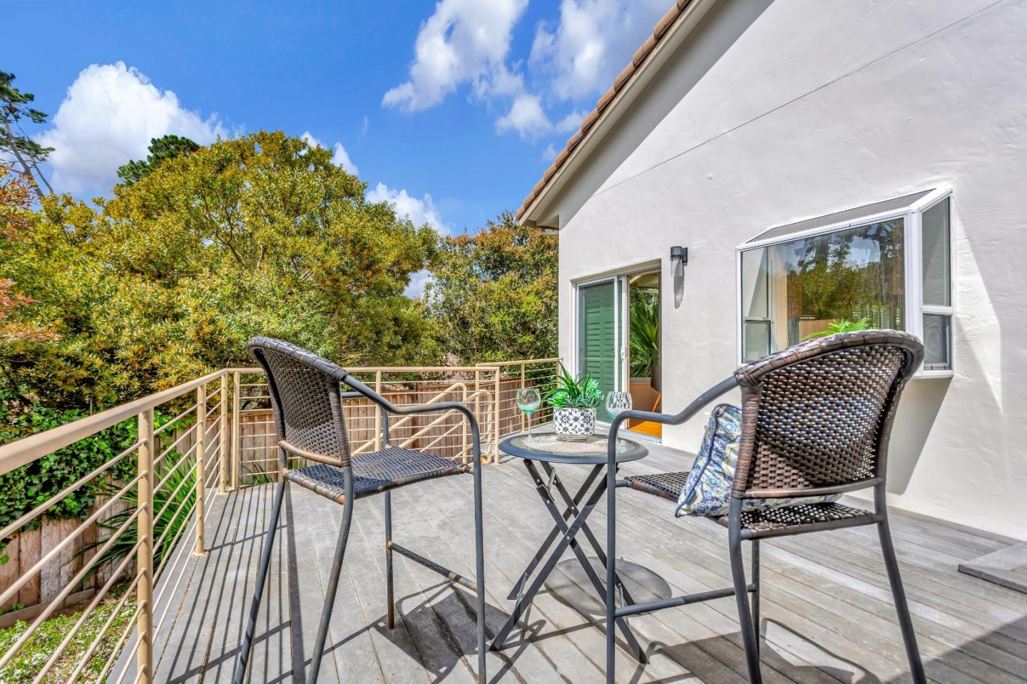 3120 Middle Ranch Road Pebble Beach, CA 93953 - Photo 35 of 39 a view of a chair and tables in the balcony