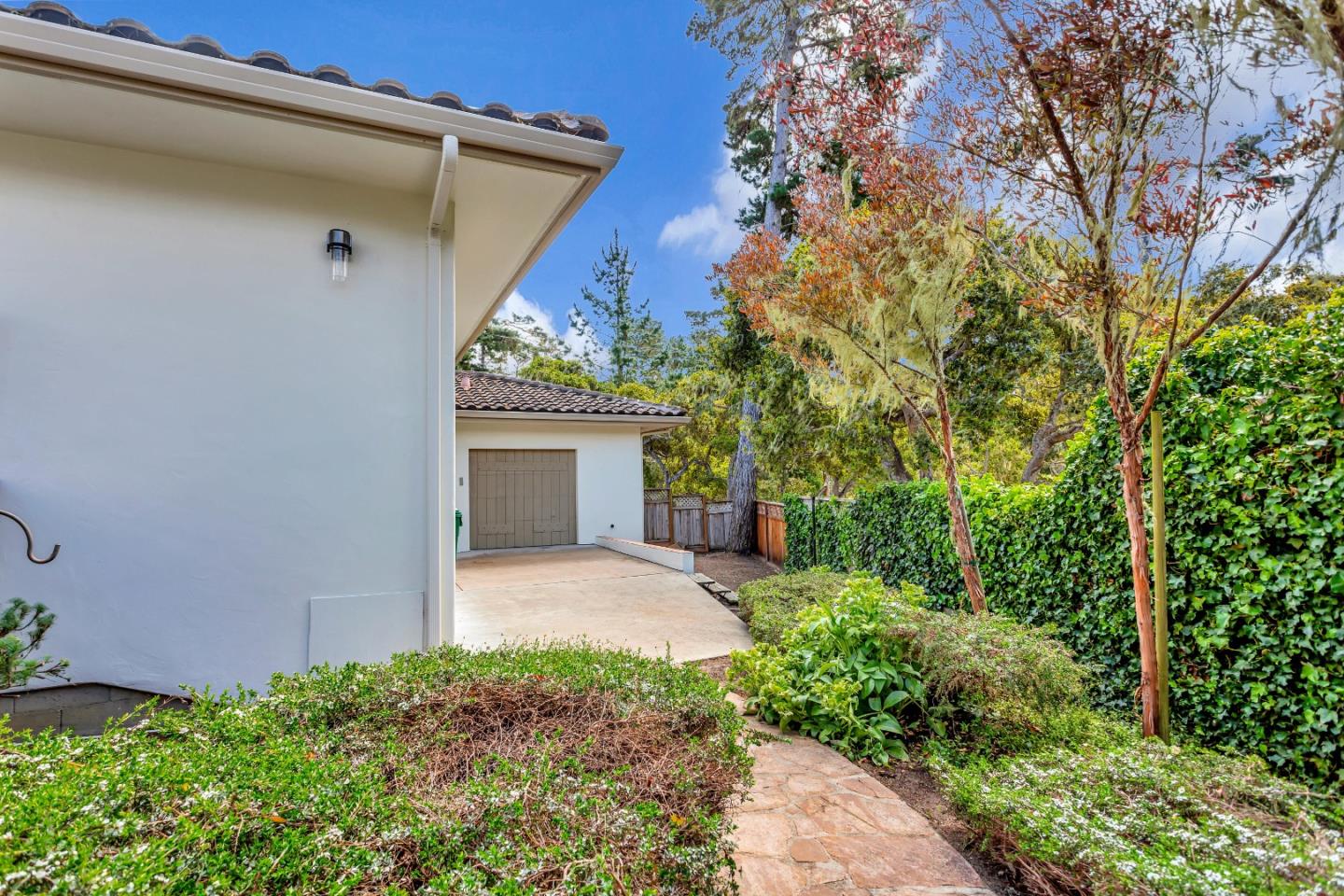 3120 Middle Ranch Road Pebble Beach, CA 93953 - Photo 36 of 39 a front view of a house with garden