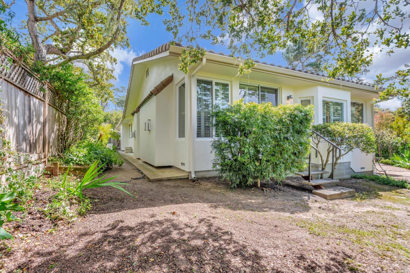 3120 Middle Ranch Road Pebble Beach, CA 93953 - Photo 39 of 39 a front view of a house with garden