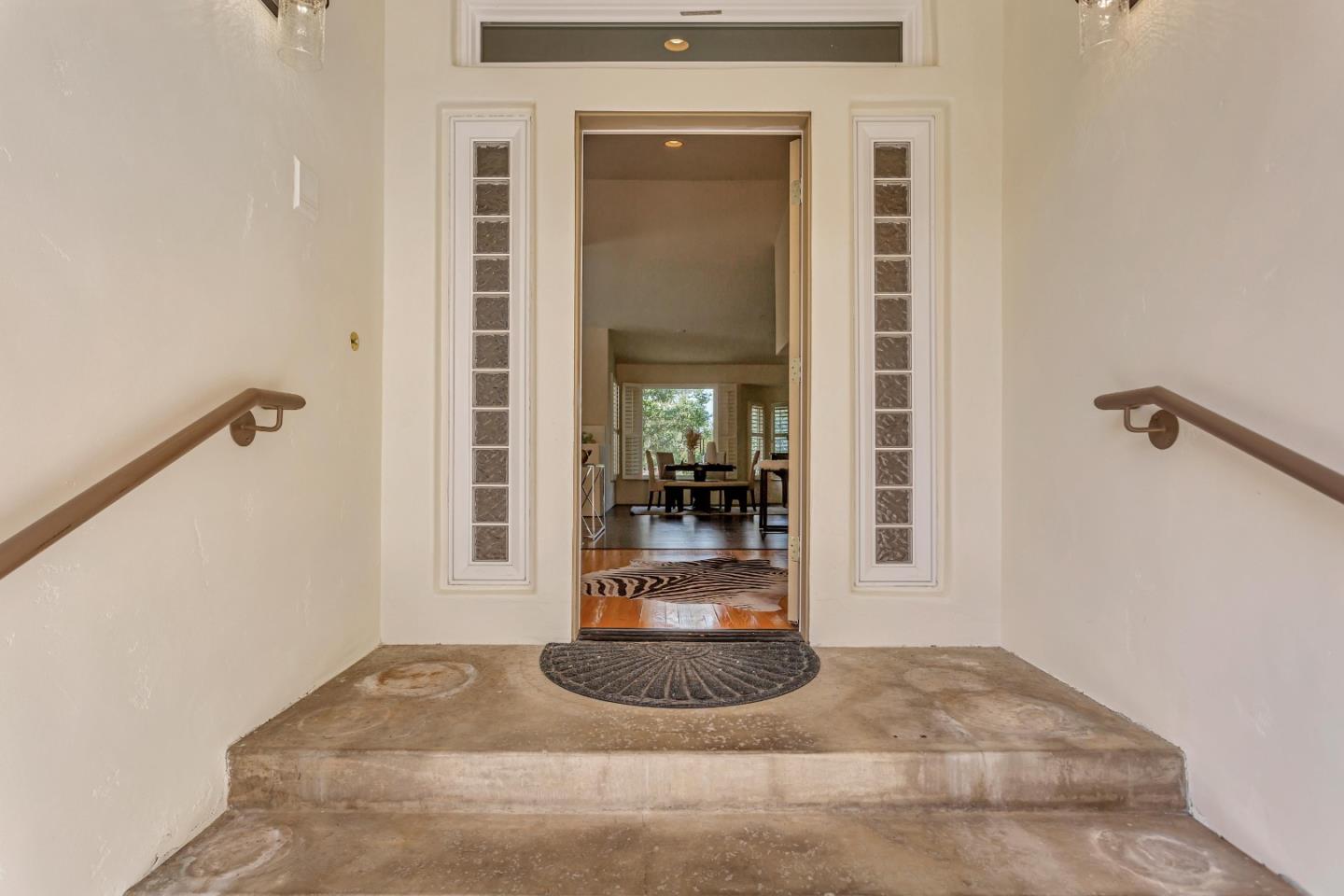 3120 Middle Ranch Road Pebble Beach, CA 93953 - Photo 5 of 39 a view of a hallway with a living room