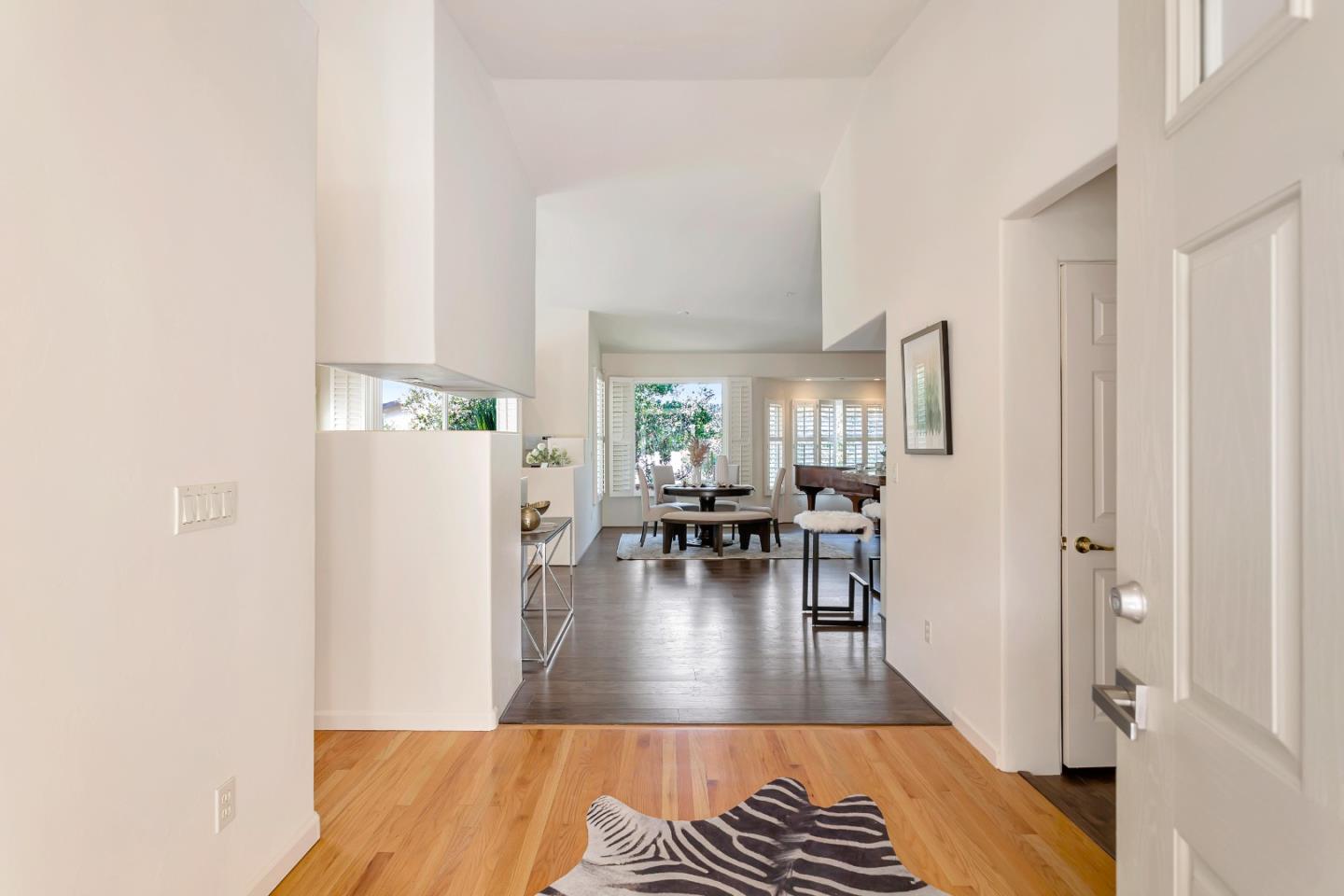 3120 Middle Ranch Road Pebble Beach, CA 93953 - Photo 6 of 39 a view of dining room with furniture and wooden floor