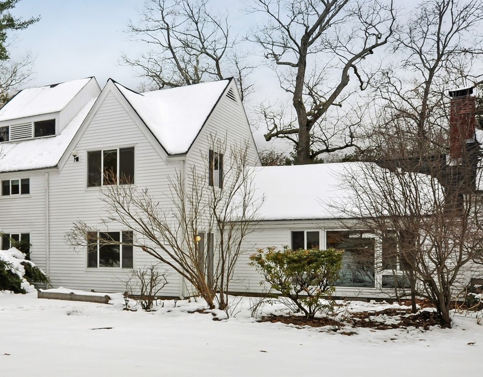 36 Todd Pond Road, Unit 36 Lincoln, MA 01773 - Photo 1 of 26 a view of a house with a snow in the yard