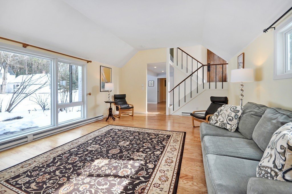 36 Todd Pond Road, Unit 36 Lincoln, MA 01773 - Photo 3 of 26 a living room with furniture and a rug