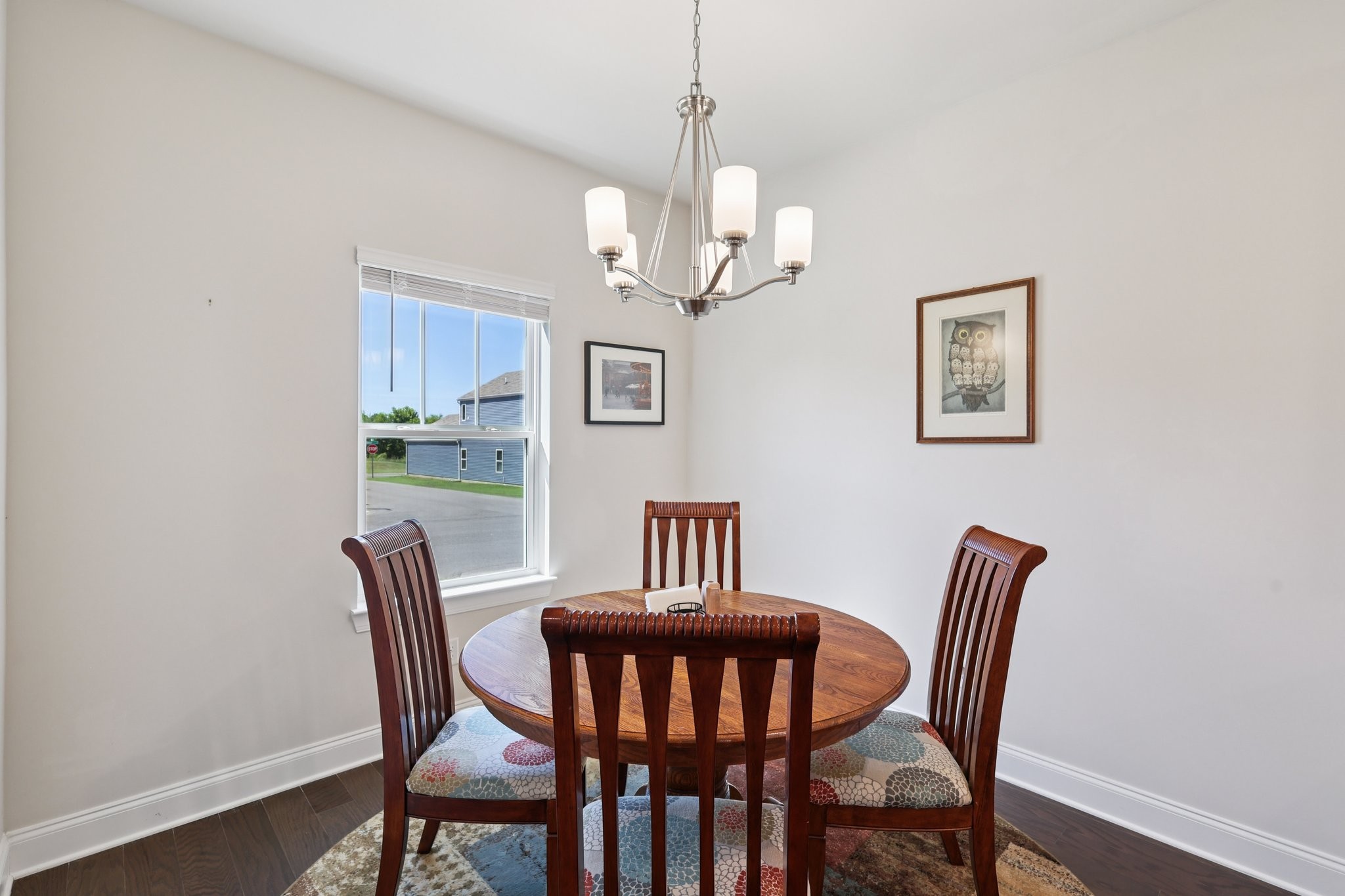 668 Taylor Bend Columbia, TN 38401 - Photo 6 of 35 a view of a dining room with furniture a chandelier and wooden floor