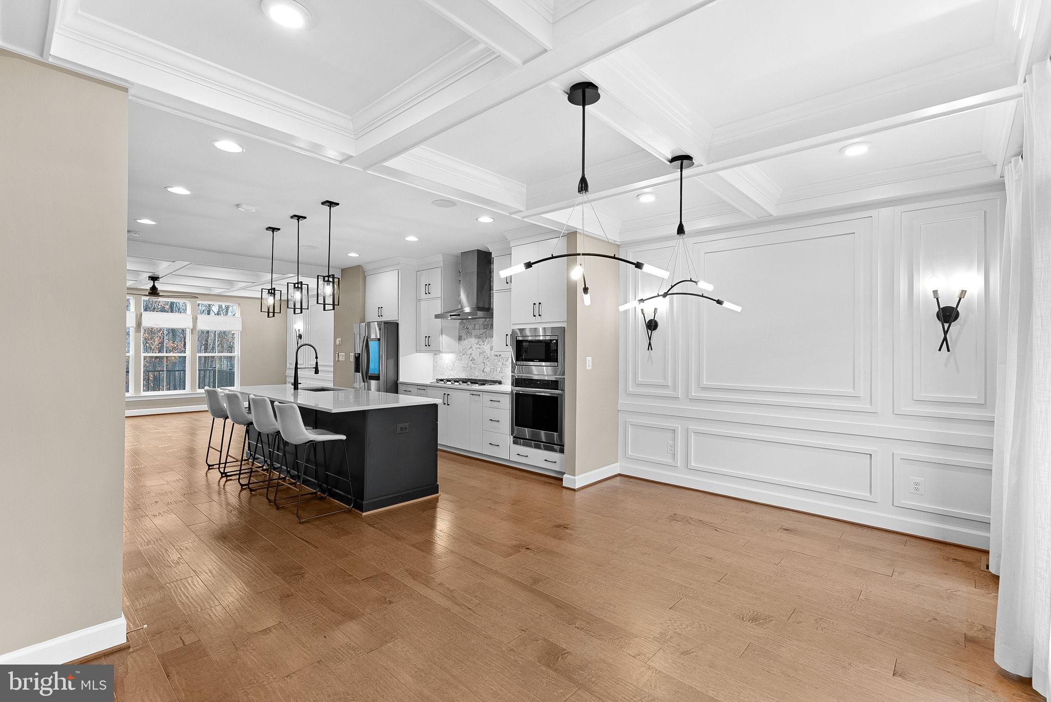 5159 Ridgeview Retreat Drive Chantilly, VA 20151 - Photo 14 of 59 a large kitchen with a lot of counter space and a refrigerator