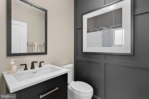 a bedroom with a large bed and a large window