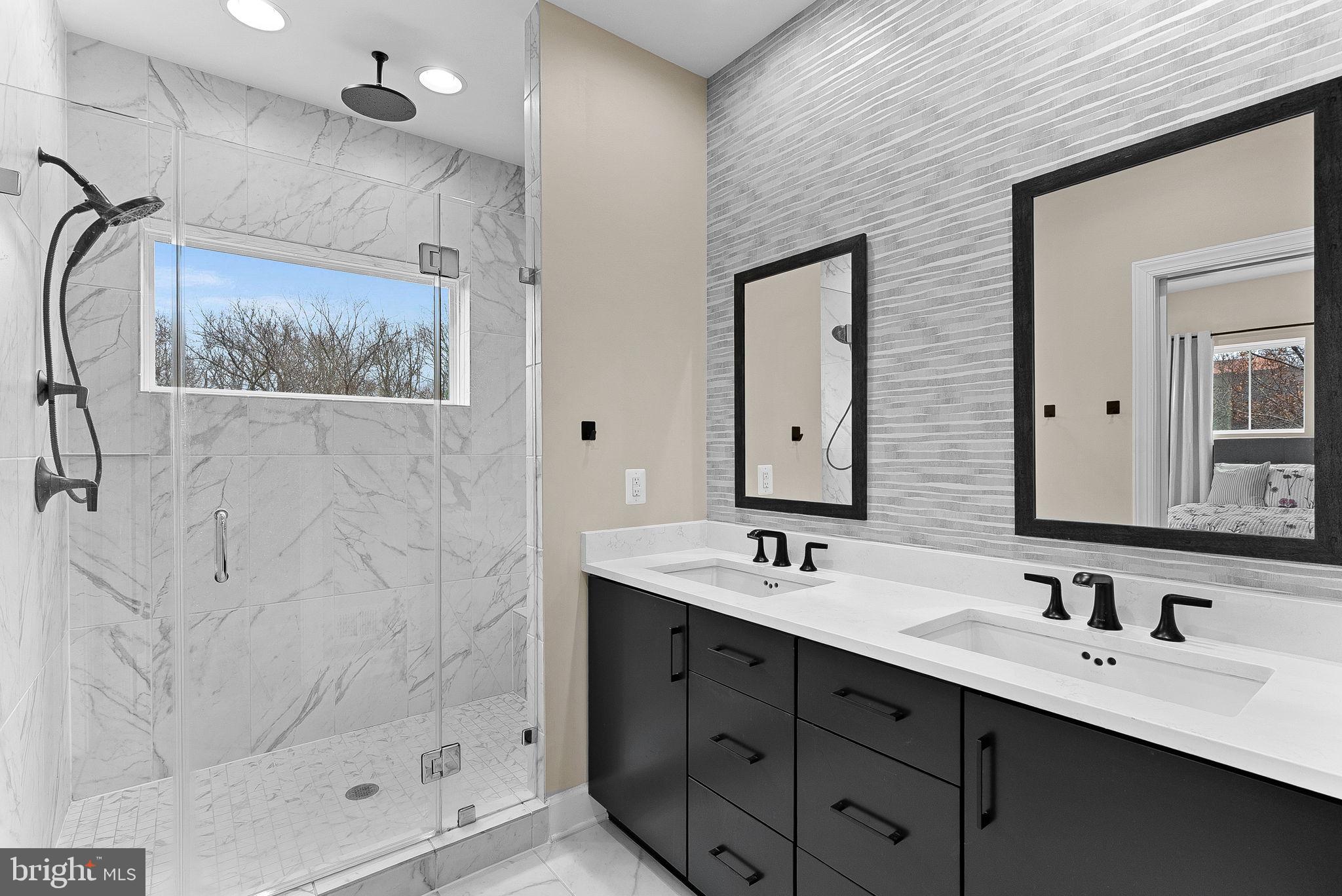 5159 Ridgeview Retreat Drive Chantilly, VA 20151 - Photo 29 of 59 a bathroom with a double vanity sink mirror double and shower