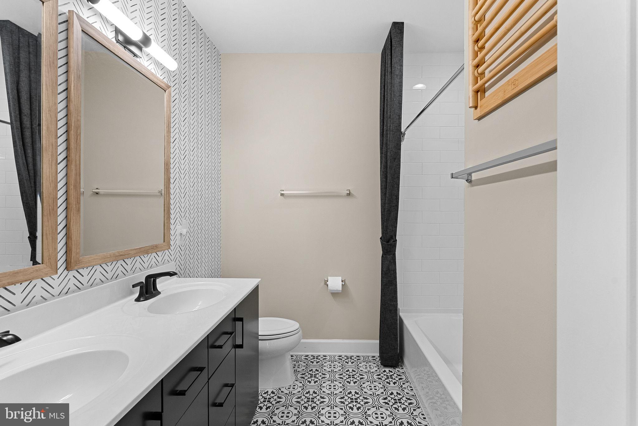 5159 Ridgeview Retreat Drive Chantilly, VA 20151 - Photo 35 of 59 a bathroom with a sink a toilet and shower