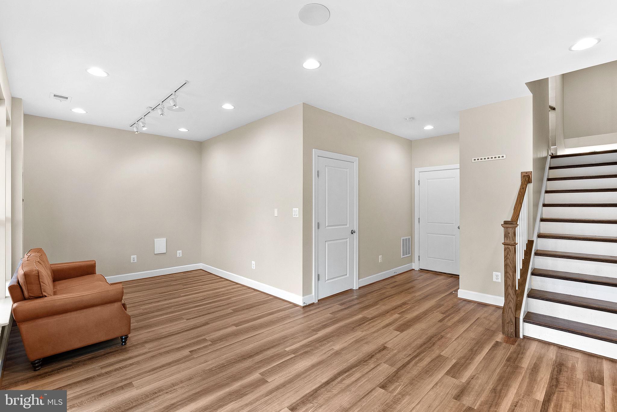 5159 Ridgeview Retreat Drive Chantilly, VA 20151 - Photo 43 of 59 a view of livingroom with hardwood floor and stairs