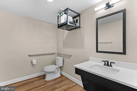 a front view of a house with a yard table and chairs