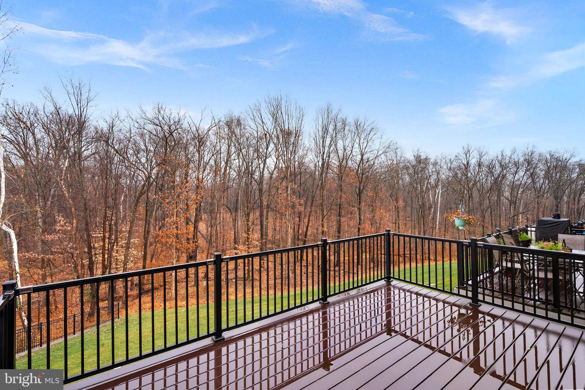 5159 Ridgeview Retreat Drive Chantilly, VA 20151 - Photo 45 of 59 a view of a balcony with wooden fence
