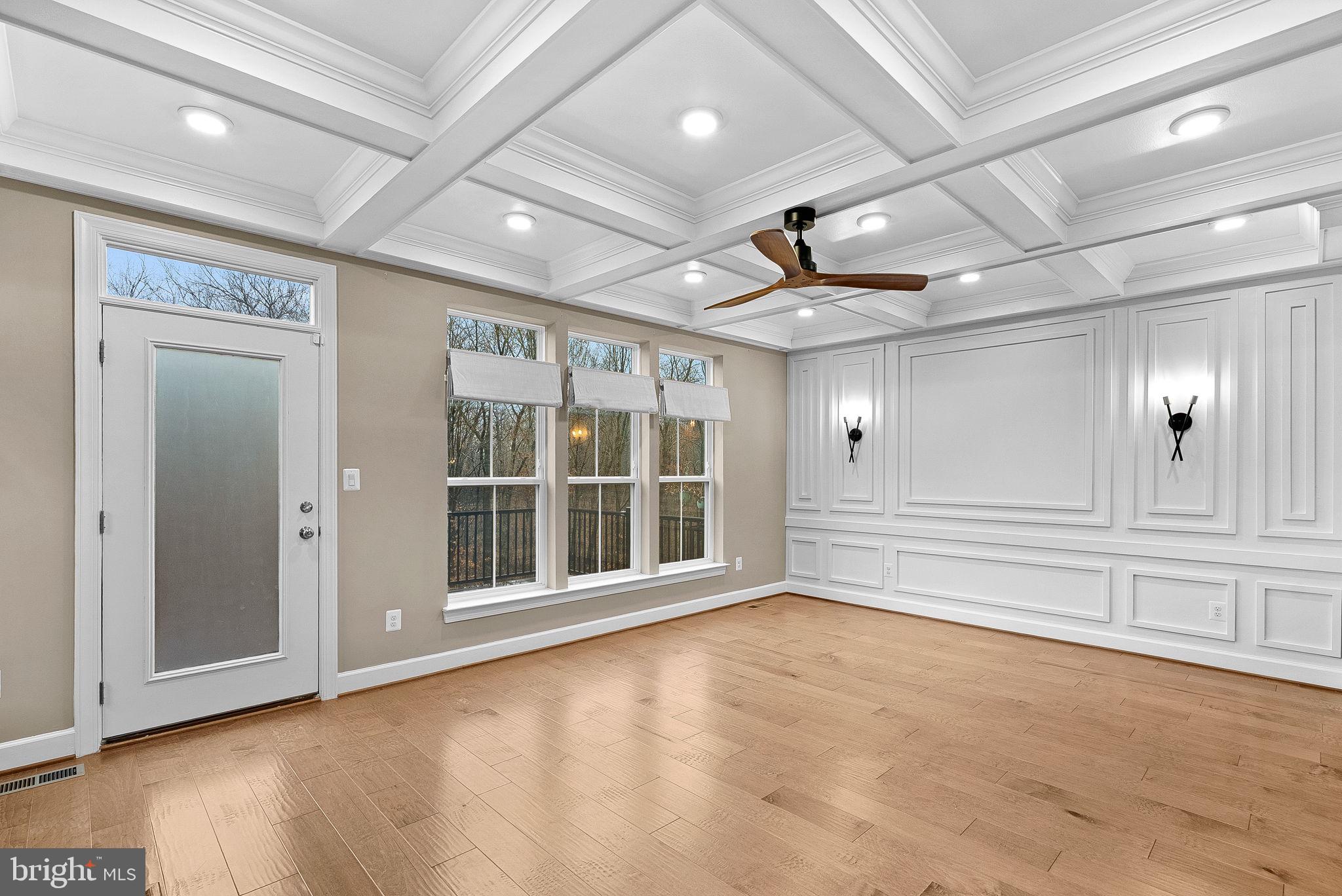 5159 Ridgeview Retreat Drive Chantilly, VA 20151 - Photo 6 of 59 a view of an empty room with wooden floor and a window