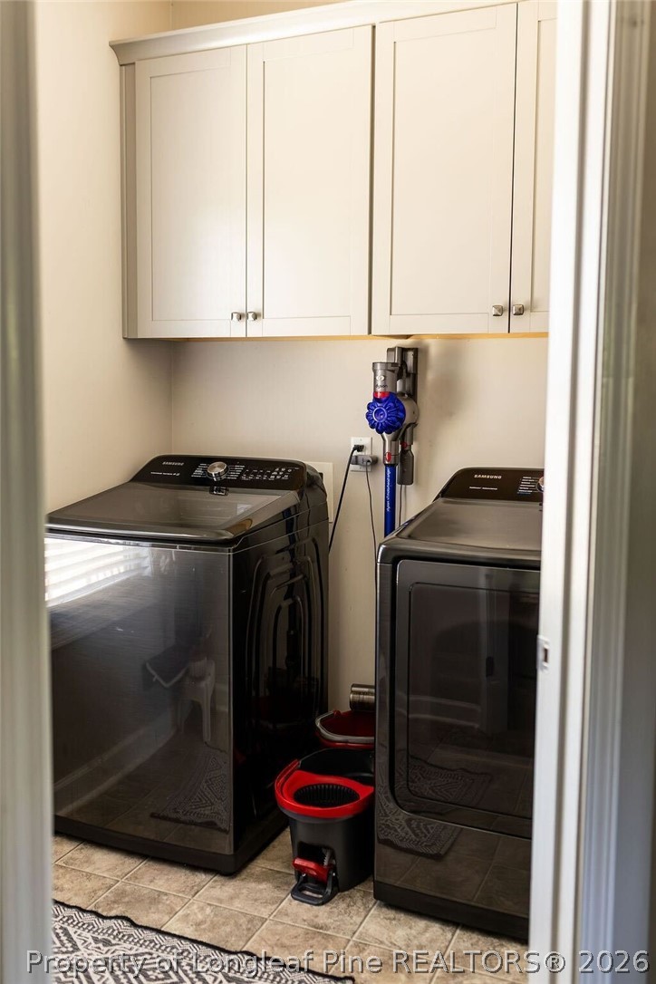 210 McGougan Road Lumber Bridge, NC 28357 - Photo 9 of 47 a utility room with dryer and washer