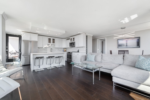 Undisclosed Address Chicago, IL 60610 - Photo 5 of 8 a living room with furniture and a wooden floor