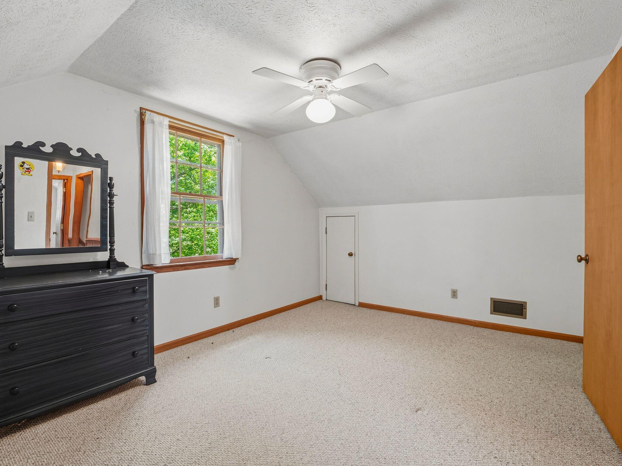 1115 Robin Ridge Road Henry, VA 24102 - Photo 26 of 54 a view of an empty room with a window