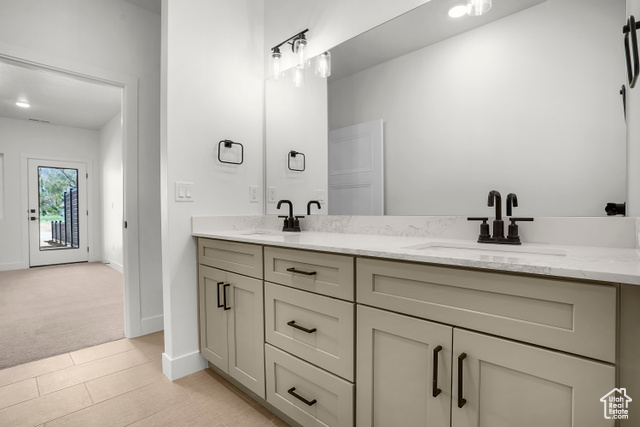 1631 West Century Lane, Unit B Mapleton, UT 84664 - Photo 20 of 33 Full bathroom featuring double vanity and light tile patterned floors