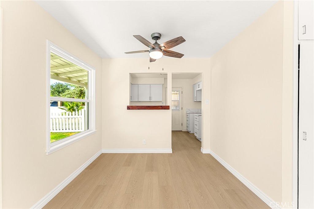 1253 Cottonwood Road Banning, CA 92220 - Photo 11 of 22 a view of an empty room with a window