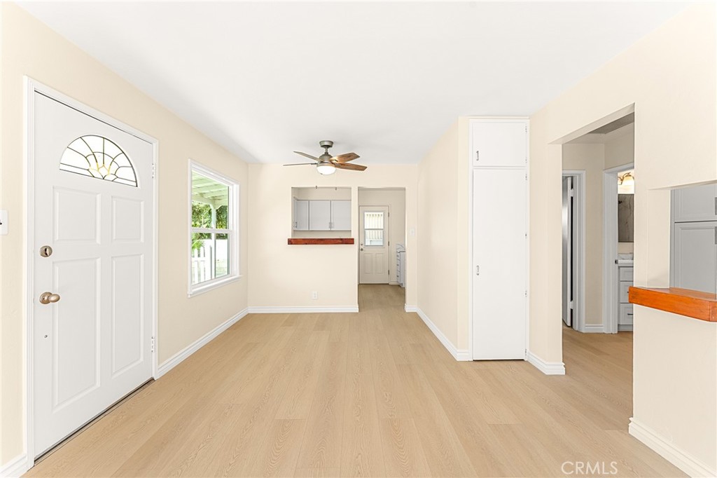 1253 Cottonwood Road Banning, CA 92220 - Photo 12 of 22 a view of a kitchen with a refrigerator a microwave and a sink