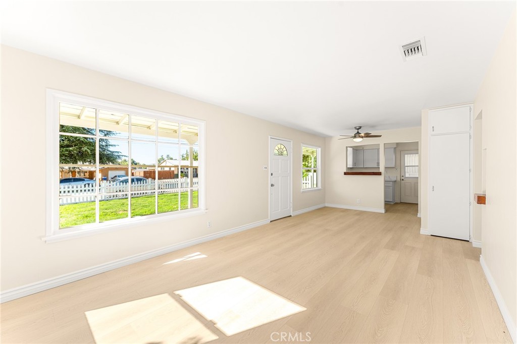 1253 Cottonwood Road Banning, CA 92220 - Photo 13 of 22 a view of empty room with windows