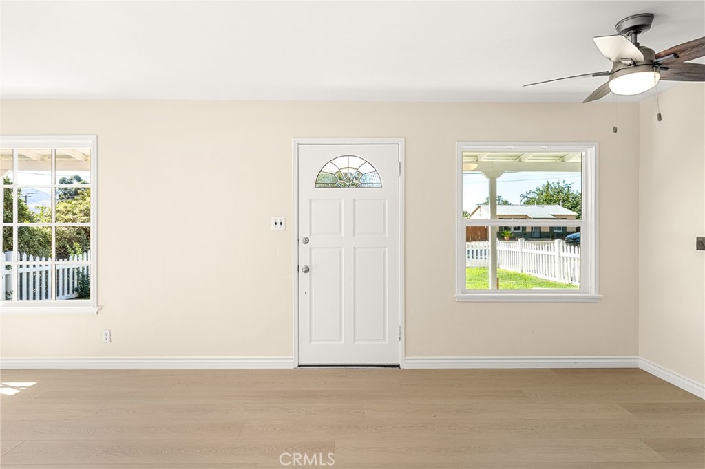 1253 Cottonwood Road Banning, CA 92220 - Photo 15 of 22 an empty room with windows and closet