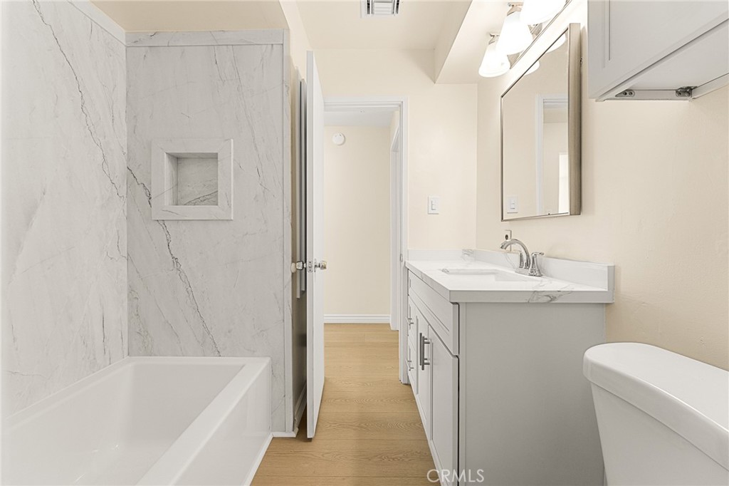 1253 Cottonwood Road Banning, CA 92220 - Photo 16 of 22 a bathroom with a sink a toilet and shower