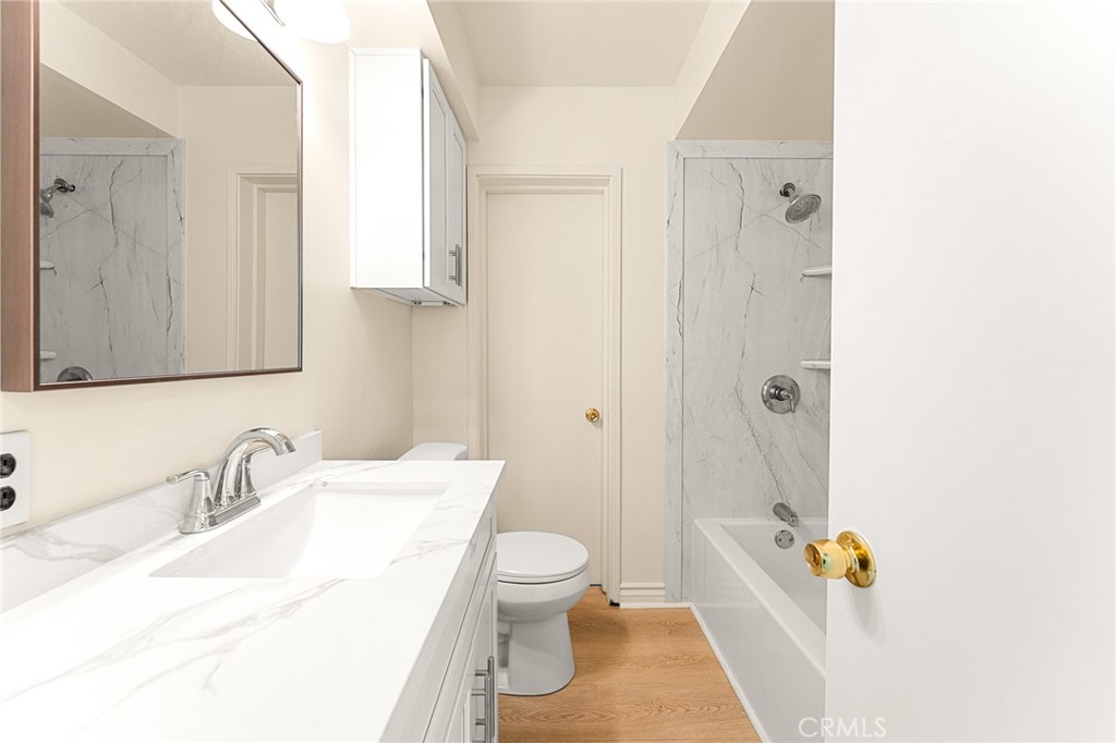 1253 Cottonwood Road Banning, CA 92220 - Photo 17 of 22 a bathroom with a sink toilet and shower