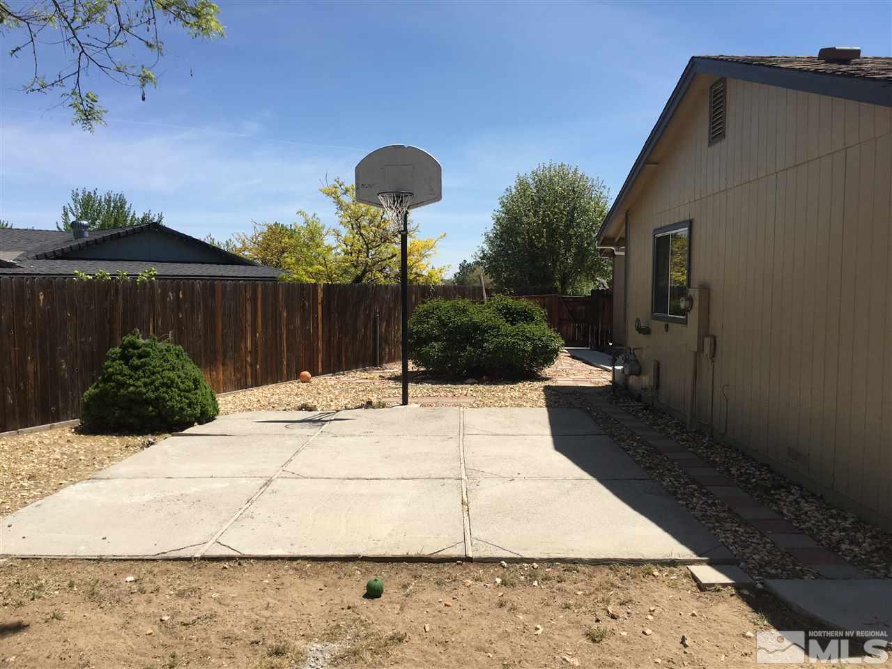 6501 Flower Street Reno, NV 89506 - Photo 16 of 19 a view of a backyard