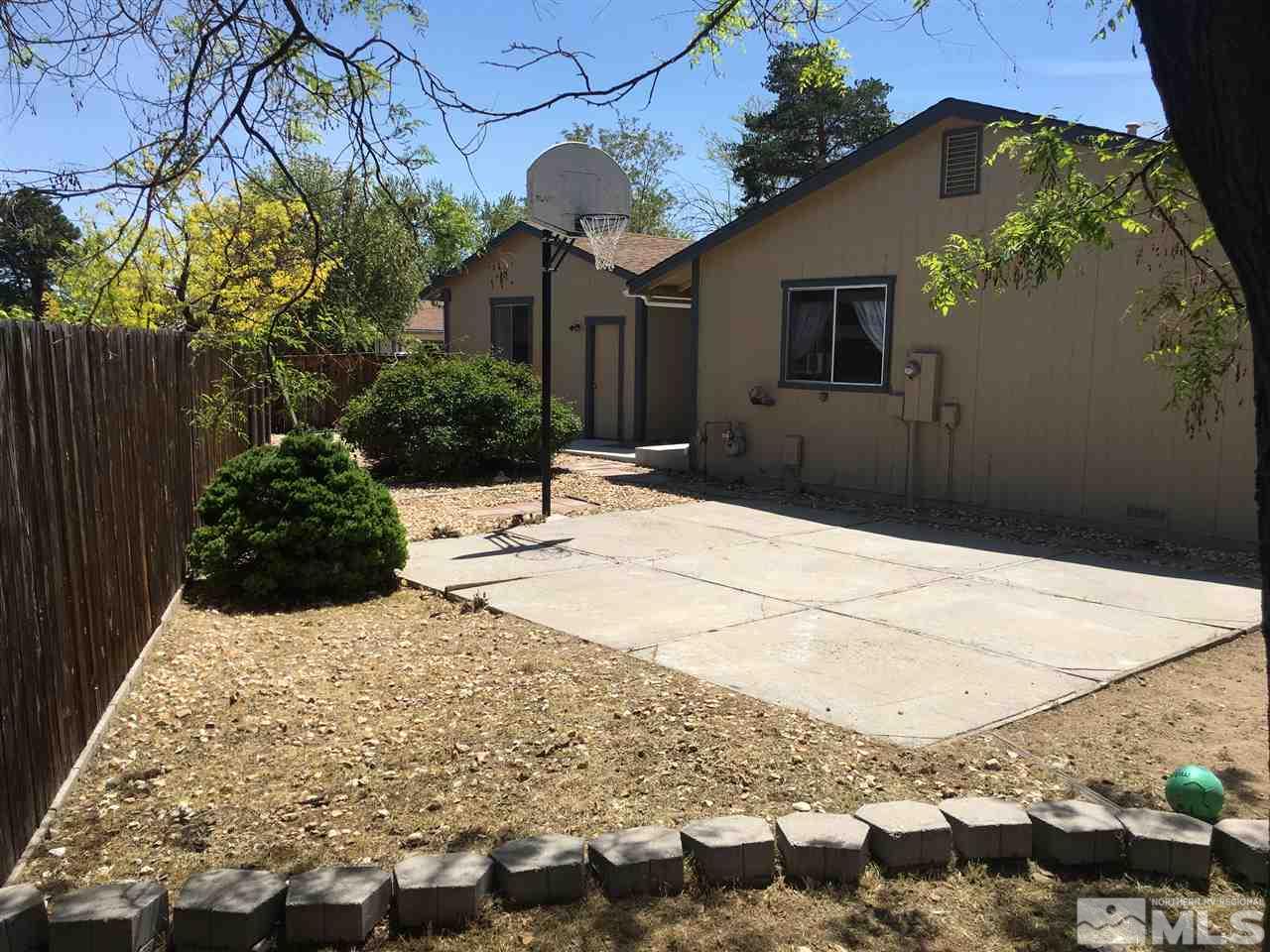 6501 Flower Street Reno, NV 89506 - Photo 18 of 19 a view of a backyard of the house