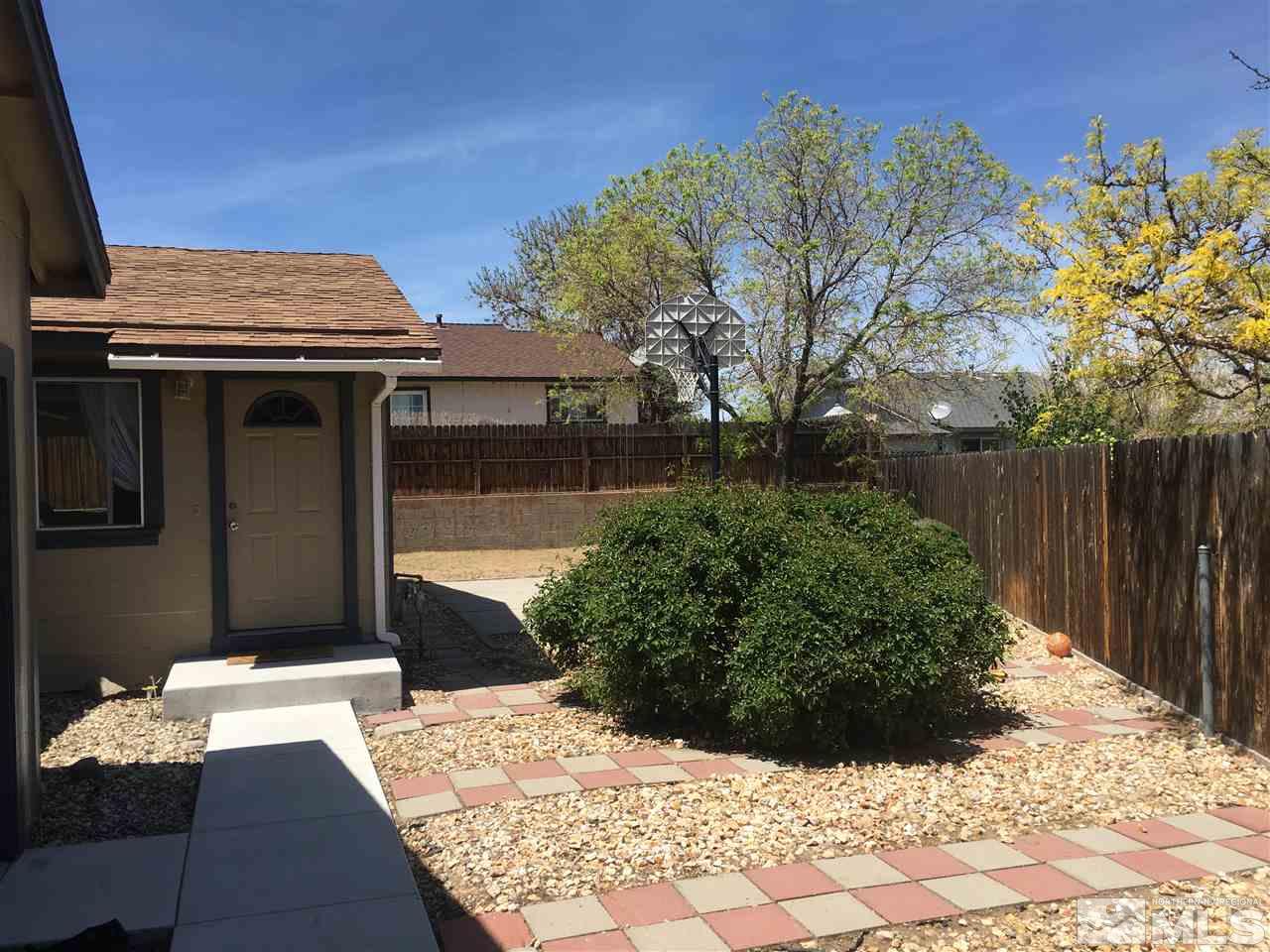 6501 Flower Street Reno, NV 89506 - Photo 19 of 19 a view of a backyard of the house
