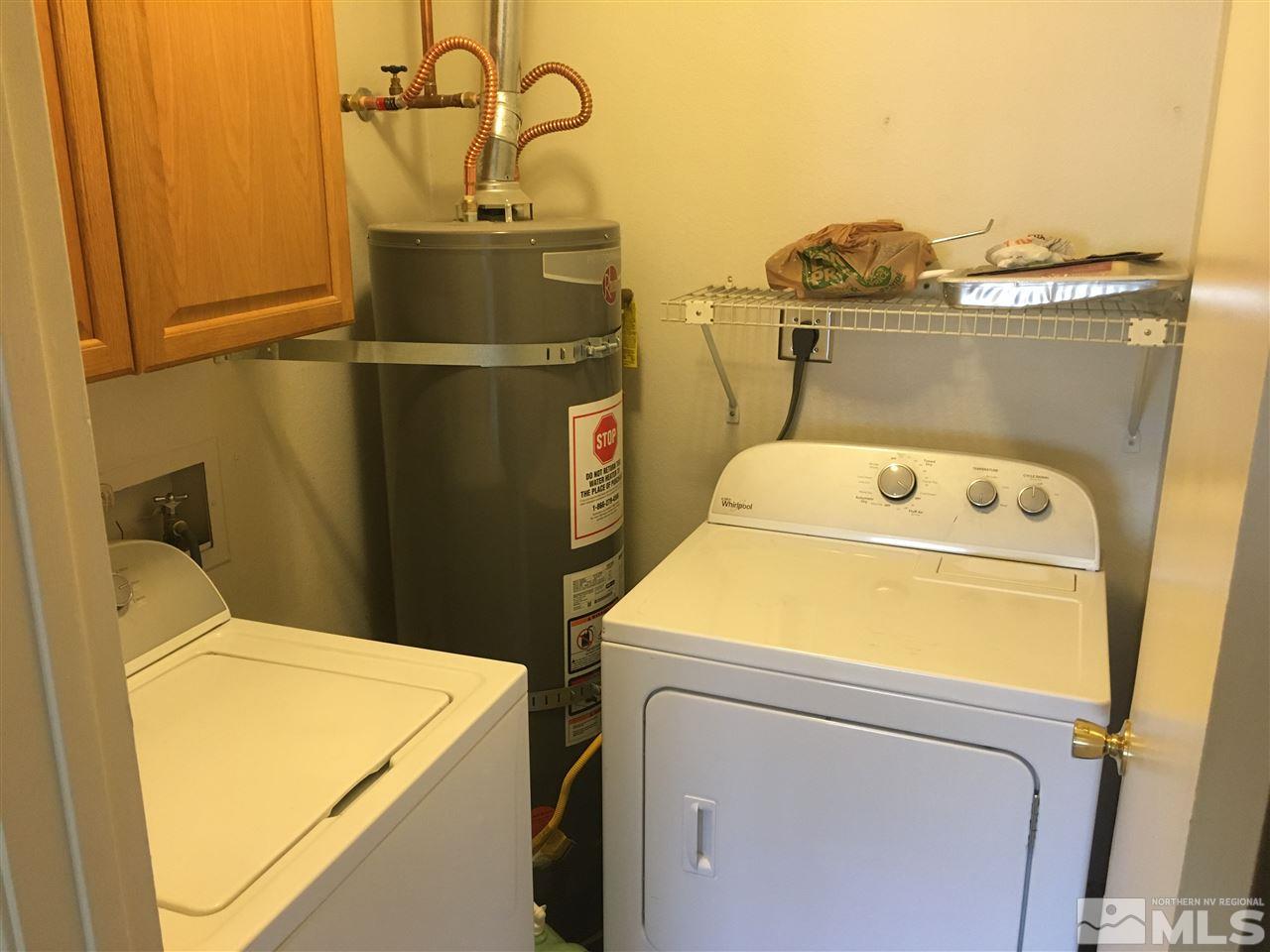 6501 Flower Street Reno, NV 89506 - Photo 7 of 19 a utility room with dryer and washer