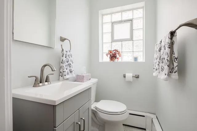 a bathroom with a sink and a toilet