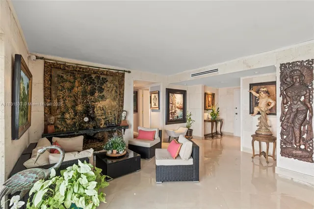 a kitchen with granite countertop white cabinets and stainless steel appliances