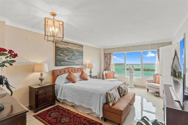 a view of a hallway with wooden floor and windows