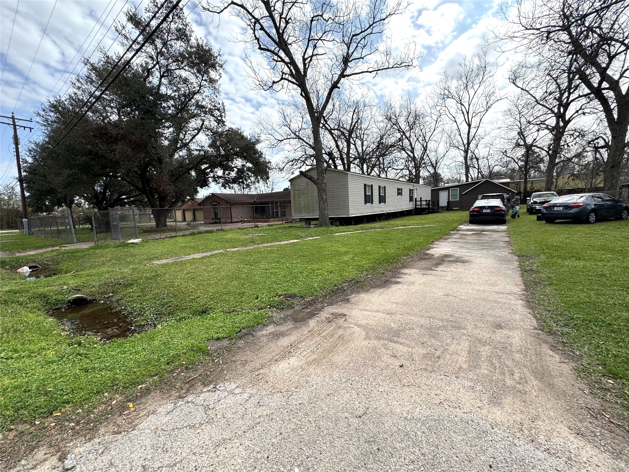 1810 Connorvale Road Houston, TX 77039 - Photo 3 of 23 a view of a park with large trees