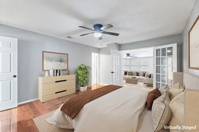 a view of livingroom and kitchen with wooden floor