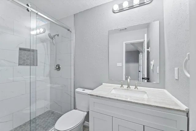 a view of livingroom with hardwood floor and a ceiling fan