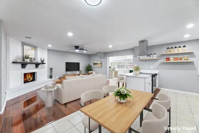 a kitchen with a sink stainless steel appliances and cabinets