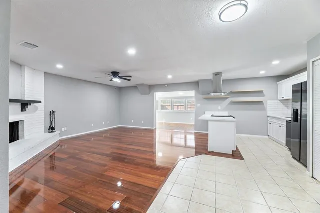 a view of a house with a yard and garage