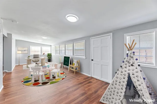 a kitchen with stainless steel appliances kitchen island granite countertop a sink and cabinets